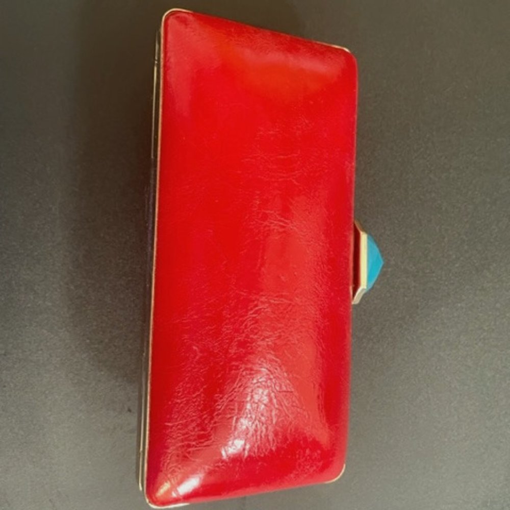 Trina Turk for Banana Republic Clutch.  Red shell with Turquoise gem clasp
